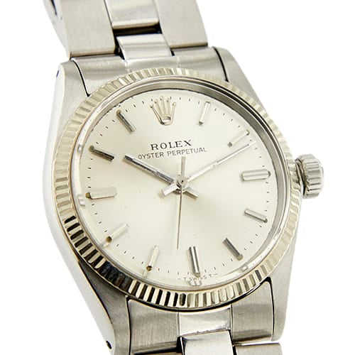 Montre Rolex Oyster Perpetual - Montre en acier, lunette cannelée en or blanc 58 Facettes 36869