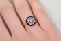 https://cdn.shopify.com/s/files/1/0963/7950/2920/files/bague-en-or-jaune-ornee-d-une-plaque-d-email-bleue-foncee-surmontee-de-diamants-et-d-oxydes-formant-une-etoile-bague-de-fiancailles.png?v=1791901358