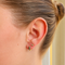 https://cdn.shopify.com/s/files/1/0829/5212/6812/files/Gouden_oorbellen_hoops_groene_edelestenen.png?v=1792066394