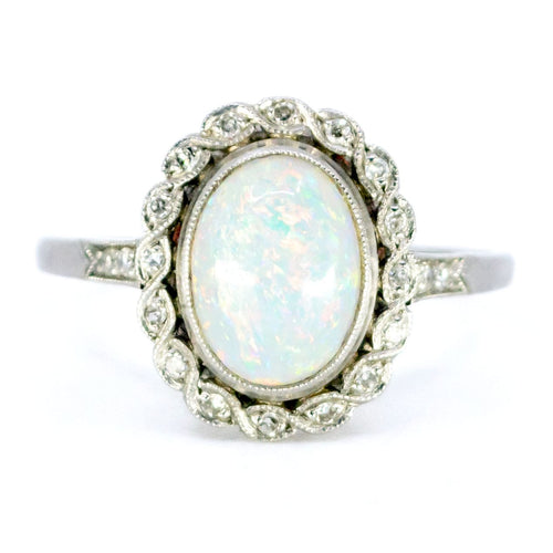 Bague 54 Bague ovale en platine avec opale et diamants 58 Facettes 39E179AC58BE488FB4B864718383155A