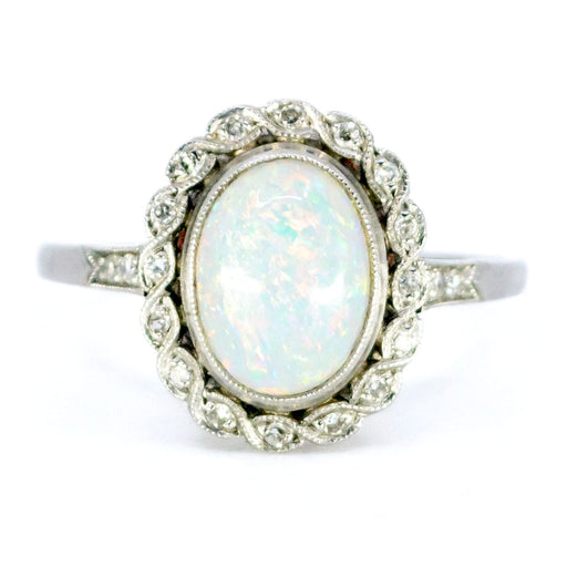 Bague 54 Bague ovale en platine avec opale et diamants 58 Facettes 39E179AC58BE488FB4B864718383155A