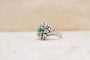 https://cdn.shopify.com/s/files/1/0963/7950/2920/files/bague-or-blanc-diamants-emeraude.jpg?v=1792577173
