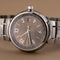 Montre Louis Vuitton - Montre Tambour Q1132 en acier 58 Facettes TOT-12030