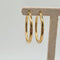 Boucles d'oreilles Créoles en or jaune 18k 58 Facettes #3948