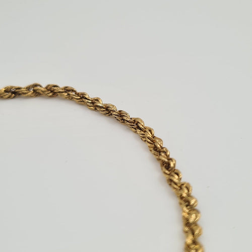 Bracelet Bracelet chaîne corde en or jaune 18k 58 Facettes #4539