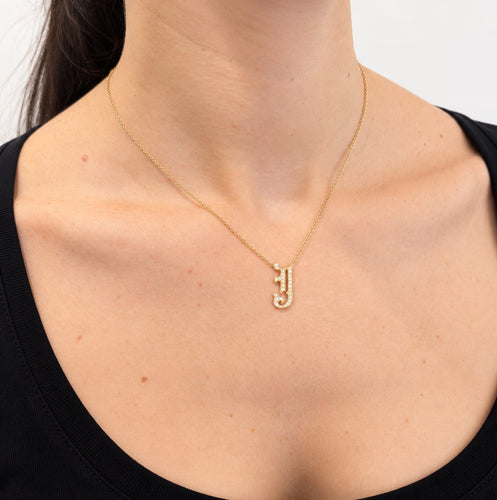 Collier Collier en or jaune 18 carats avec pendentif initiale J pavé de diamants 58 Facettes 38013