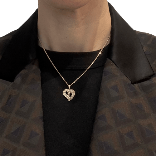 Pendentif Pendentif cœur en or jaune et diamants 58 Facettes Z15B51614