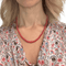 Collier Collier en or jaune et corail 58 Facettes Z1351779