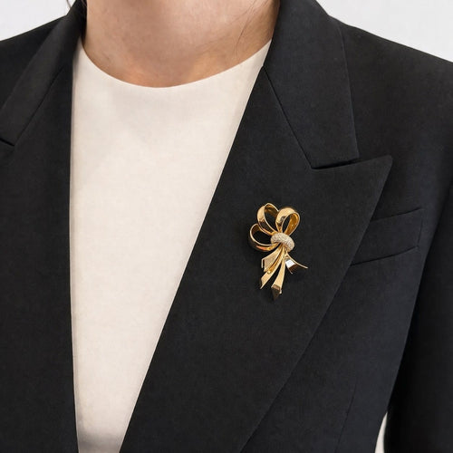 Broche Broche nœud en or jaune 18 carats et diamants 58 Facettes 25564
