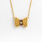 Collier Fred Nœuds - Collier en or jaune, diamant et rubis 58 Facettes 28068
