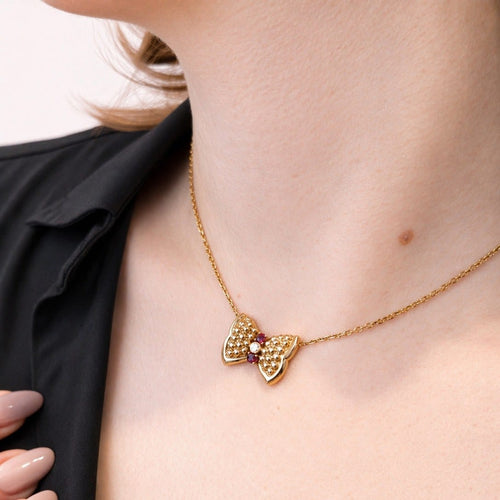 Collier Fred Nœuds - Collier en or jaune, diamant et rubis 58 Facettes 28068