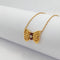 Collier Fred Nœuds - Collier en or jaune, diamant et rubis 58 Facettes 28068