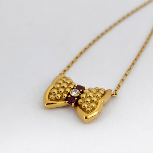Collier Fred Nœuds - Collier en or jaune, diamant et rubis 58 Facettes 28068