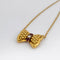 Collier Fred Nœuds - Collier en or jaune, diamant et rubis 58 Facettes 28068