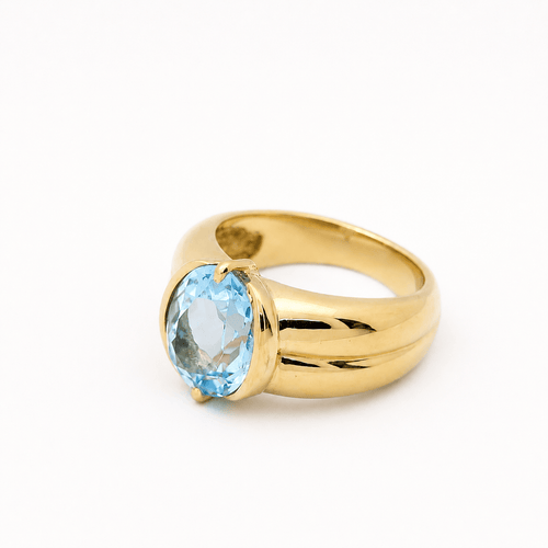 Bague 49 Bague en or jaune 18 carats et topaze bleue 58 Facettes 29045