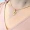 Pendentif Pendentif croix en or jaune 18 carats et pierre bleue 58 Facettes 30077