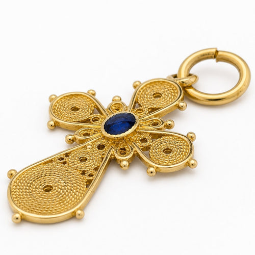 Pendentif Pendentif croix en or jaune 18 carats et pierre bleue 58 Facettes 30077