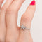 Bague 48 Bague fleur en or blanc et diamants 58 Facettes 30091