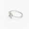 Bague 48 Bague fleur en or blanc et diamants 58 Facettes 30091
