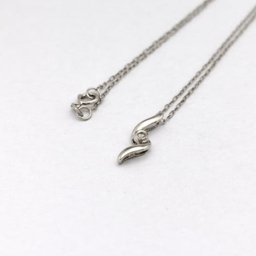 Collier Collier pendentif en or blanc et diamant 58 Facettes 30460