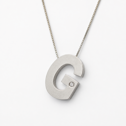 Collier Collier lettre G en or blanc et diamant 58 Facettes 30443