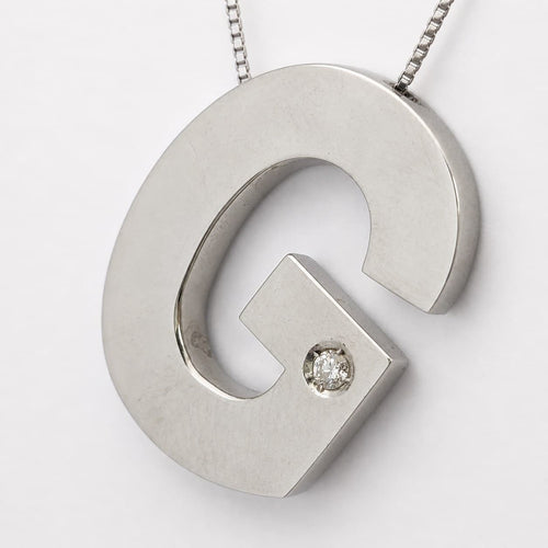 Collier Collier lettre G en or blanc et diamant 58 Facettes 30443