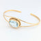 Bracelet Bracelet jonc en or jaune 18 carats et aigue-marine 58 Facettes 31240