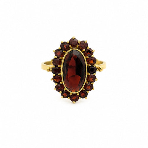 https://18carats.fr/wp-content/uploads/2025/10/32826-37546-Bague-en-or-jaune-et-grenats.jpg