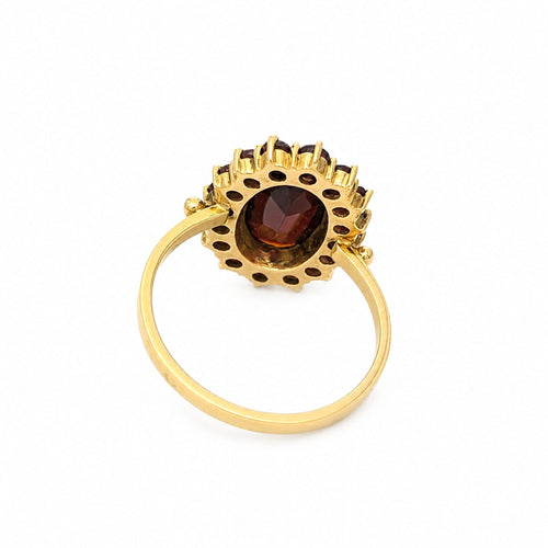 https://18carats.fr/wp-content/uploads/2025/10/32826-37549-Bague-en-or-jaune-et-grenats.jpg