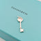 https://18carats.fr/wp-content/uploads/2025/06/32314-33206-Pendentif-Tiffany-Co-Return-to-Tiffany-Cle-Coeur-en-argent-et-diamant-scaled.jpg