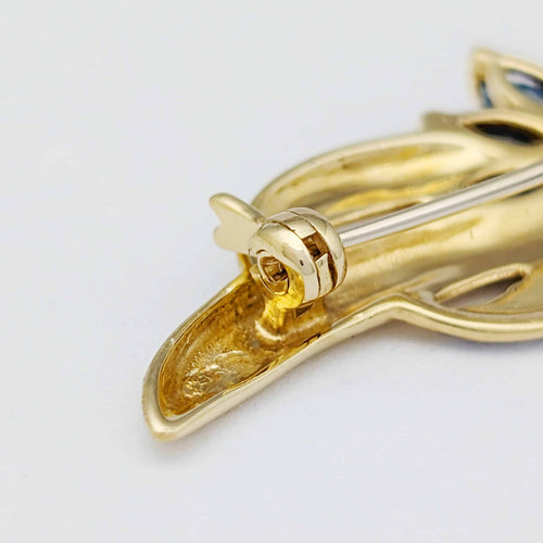 Broche Broche en or jaune 18 carats avec saphirs et diamant 58 Facettes 32262