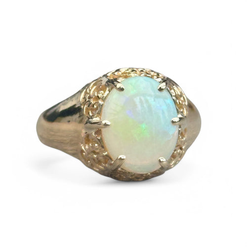 Bague 51 Bague ancienne ajourée sertie d'une opale cabochon en or jaune 58 Facettes 321