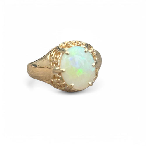 Bague 51 Bague ancienne ajourée sertie d'une opale cabochon en or jaune 58 Facettes 321