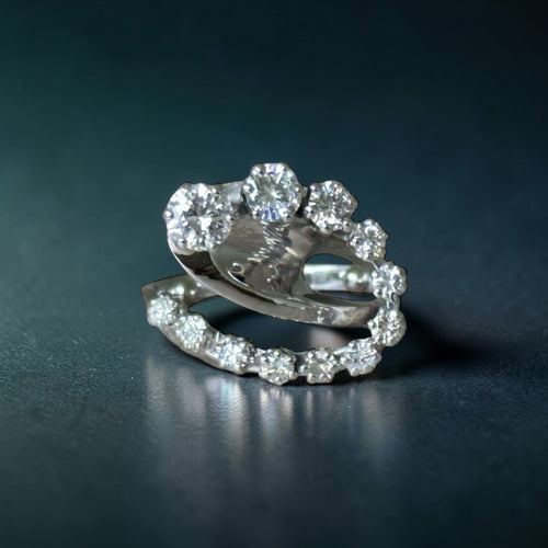 Bague 54 Bague serpentine en or blanc 18 carats sertie de diamants 1,20 ct 58 Facettes 194