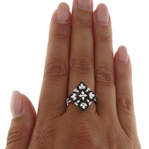 Bague Guidetti - Bague en or blanc avec diamants blancs et noirs 58 Facettes G3556