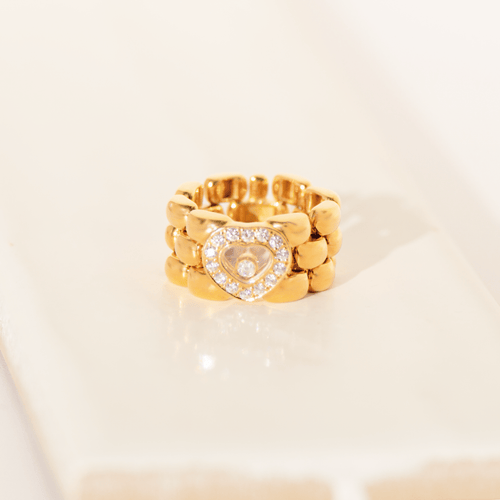 https://cdn.shopify.com/s/files/1/0442/6560/3235/files/chopard-happy-diamonds-flexibler-kettenring-aus-18-karat-gelbgold-029-ct-diamanten-grosse-53honey-jewelry-1776279.png?v=1772565051