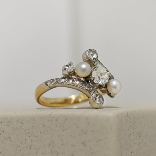 Bague 50 Bague Art nouveau en or jaune et blanc 18 carats avec perles et diamants 58 Facettes 2922