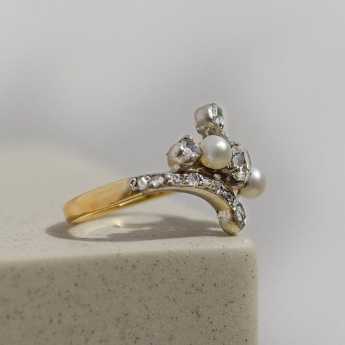 Bague 50 Bague Art nouveau en or jaune et blanc 18 carats avec perles et diamants 58 Facettes 2922