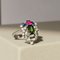 Bague 53 Bague ancienne en or blanc avec diamants, saphirs, tourmaline et péridot 58 Facettes 2516