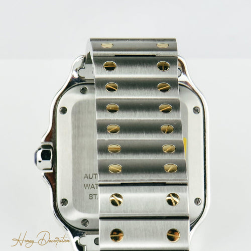 Montre Cartier Santos - Montre unisexe en or jaune 18K et acier, diamants 58 Facettes 2504