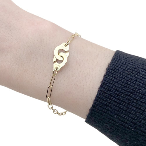 Bracelet Dinh Van Menottes R10 - Bracelet moyen modèle en or jaune 750 58 Facettes 35369