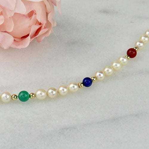 Rannekoru 14 karaatin kultainen helmikoru jalokivillä 58 Facettes 2306