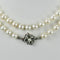 Akoya Pearl Necklace - 14-carat two-tone gold clasp and diamonds 58 Facettes 1998