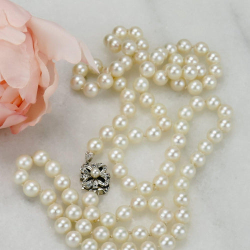 Akoya Pearl Necklace - 14-carat two-tone gold clasp and diamonds 58 Facettes 1998