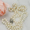 Akoya Pearl Necklace - 14-carat two-tone gold clasp and diamonds 58 Facettes 1998