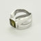 Ring 51.5 Modernist ring in white gold and peridot 58 Facettes ALB2061