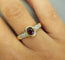 Bague 51 Bague en or jaune, diamants, rubis 58 Facettes