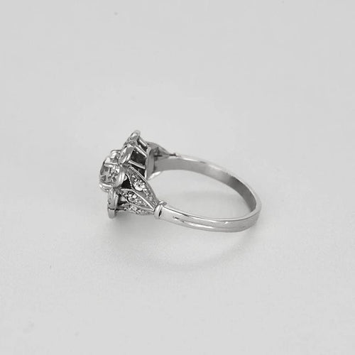 Bague 51,5 Bague marguerite en or blanc 18k, platine et diamants 58 Facettes LJ25-330