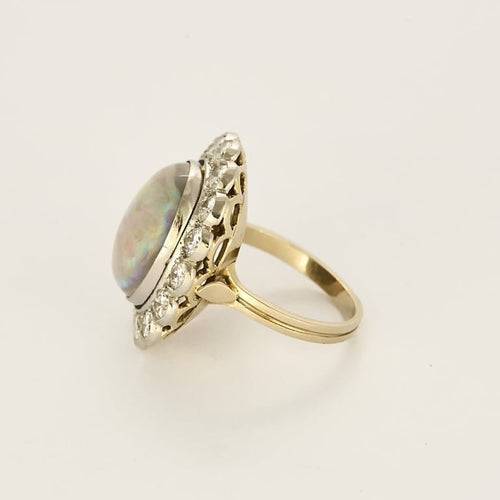 Bague 53.5 Importante bague marguerite en or blanc, opale et diamants 58 Facettes 58FC106