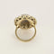 Bague 53.5 Importante bague marguerite en or blanc, opale et diamants 58 Facettes 58FC106